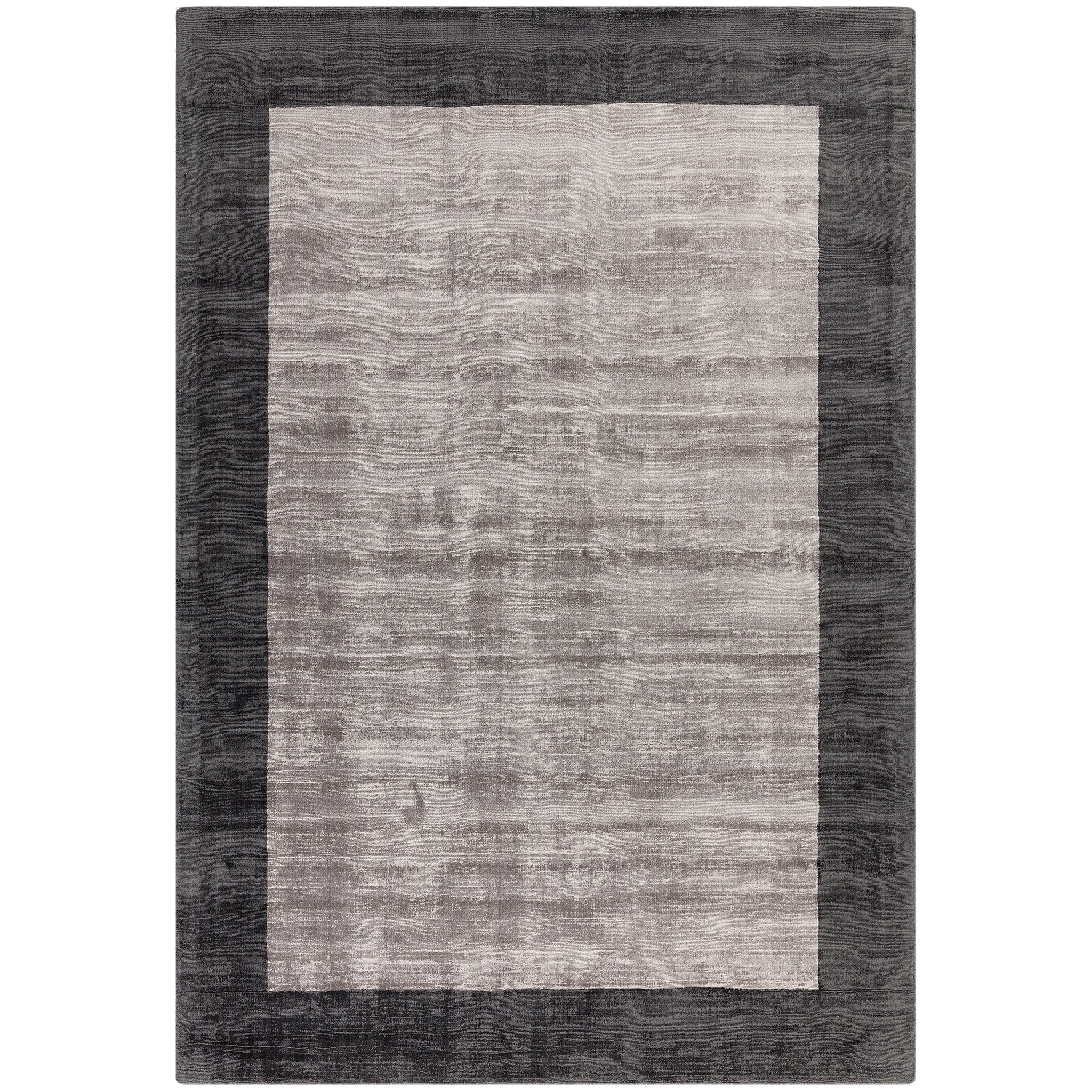 Luxury handwoven viscose rug, in silver with a wide charcoal boarder, with a tip sheared finish giving a vintage effect. Size - Large Pile Height: 7mm Dimensions: 2000 x 2900 mm 100% Viscose Hand Woven in India Delivery: 5-7 days